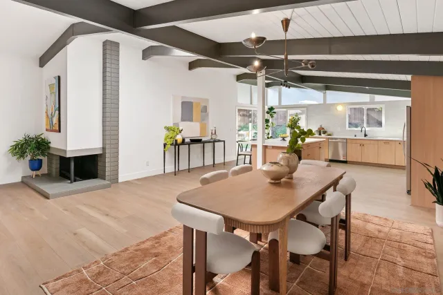 a view of living room with granite countertop furniture and a potted plant
