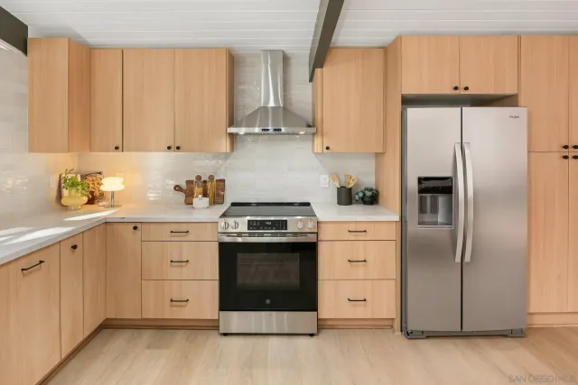 a bathroom with a granite countertop sink mirror and double