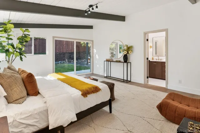 a bathroom with a double vanity sink mirror double and bathtub