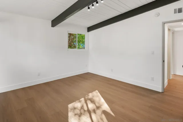 a view of a back yard of the house