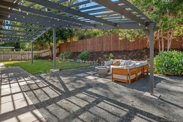 an aerial view of a house with a garden