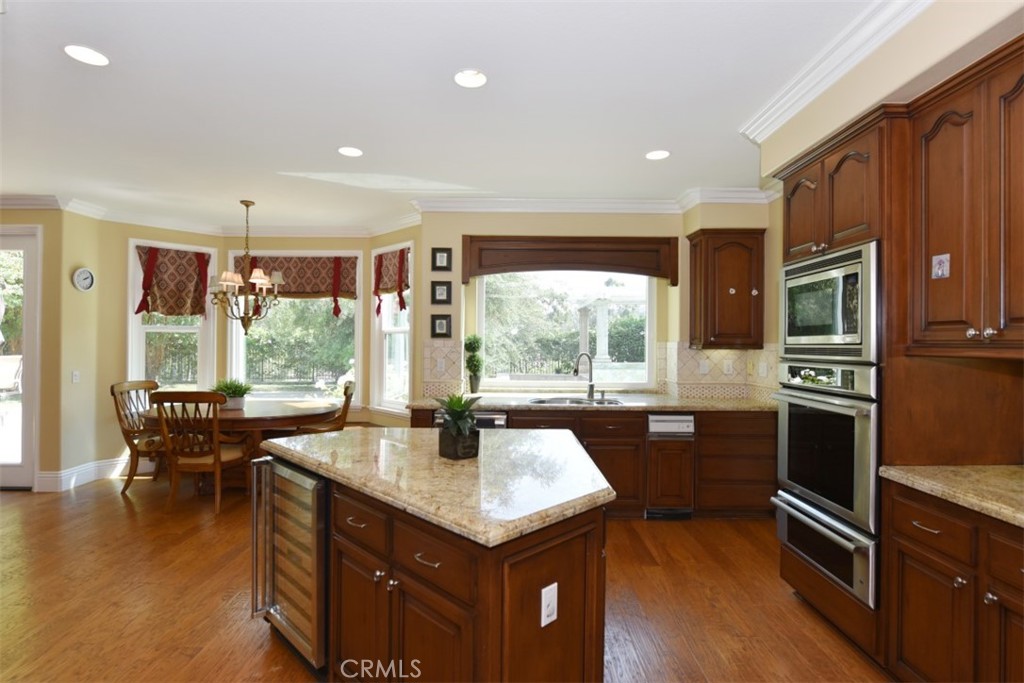 12 Brigadier Irvine, CA 92603 - Photo 12 of 50 a kitchen with a stove sink and microwave