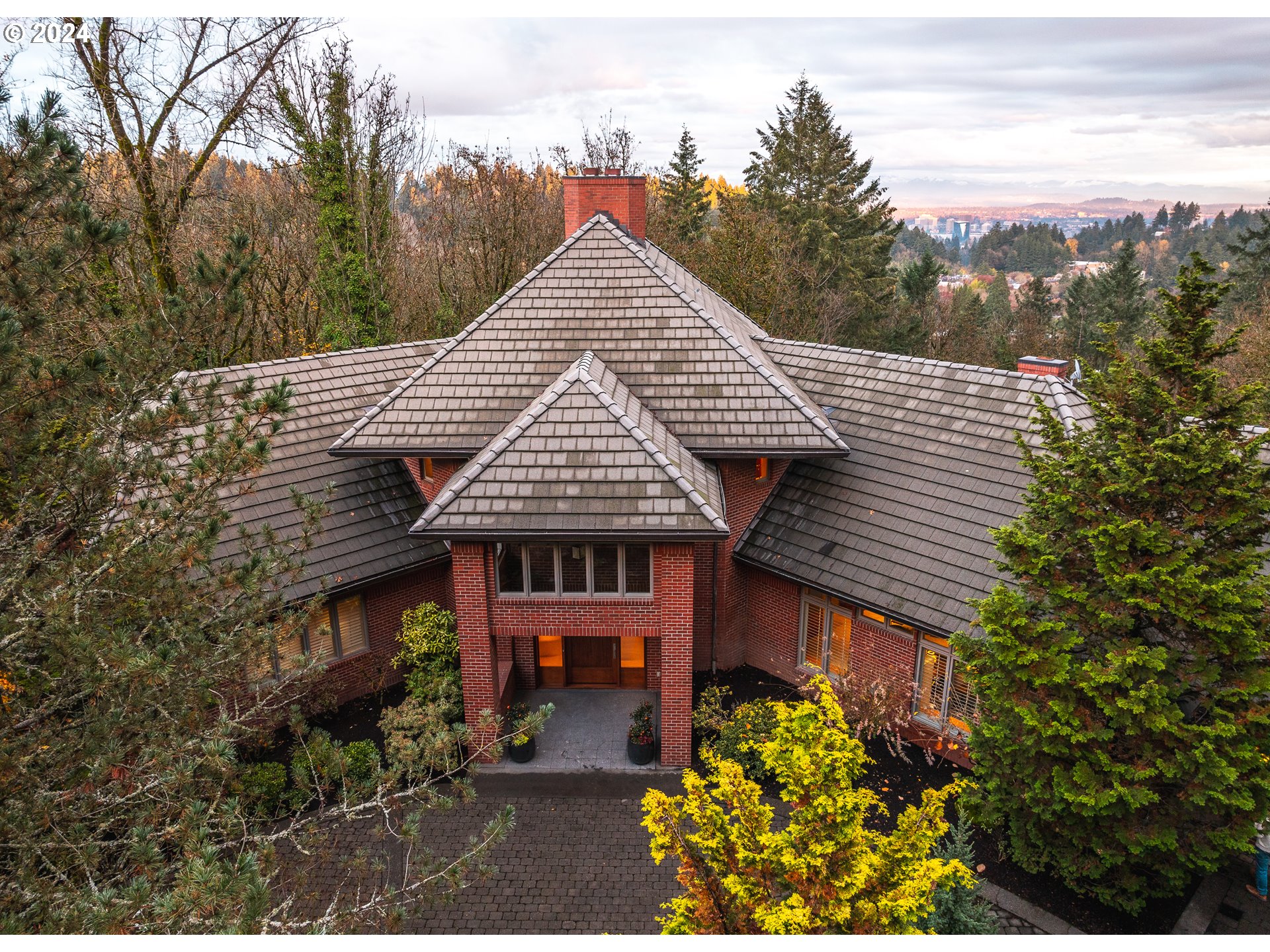 4335 Southwest Humphrey Boulevard Portland, OR 97221 - Photo 1 of 35 a view of a house with a flower garden
