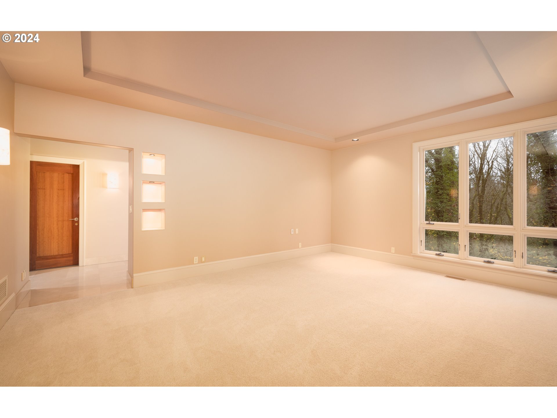 4335 Southwest Humphrey Boulevard Portland, OR 97221 - Photo 22 of 35 a view of an empty room with a window