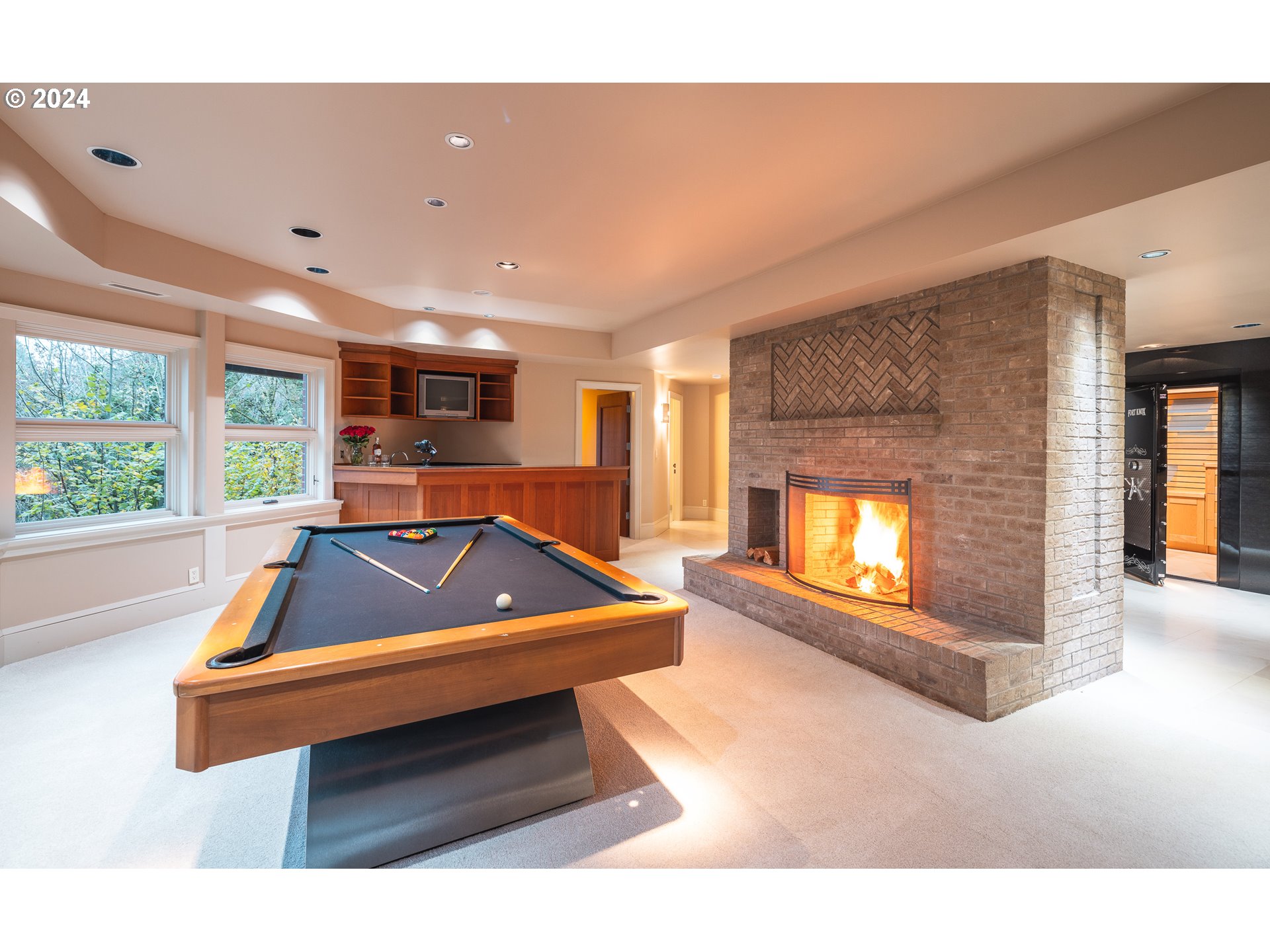 4335 Southwest Humphrey Boulevard Portland, OR 97221 - Photo 26 of 35 a room with pool table and windows
