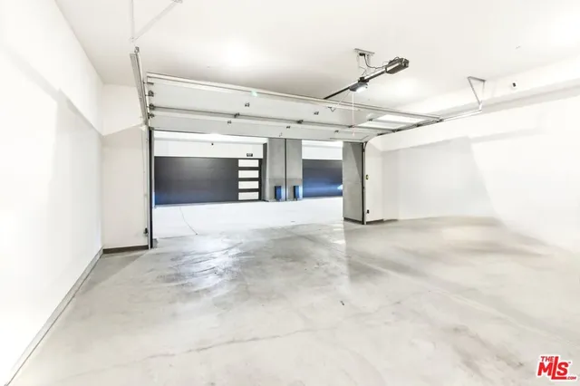 a view of a room with a garage