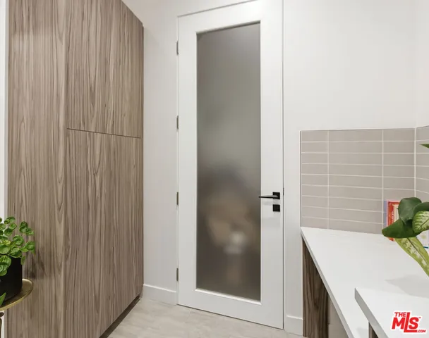 a bathroom with a tub and shower