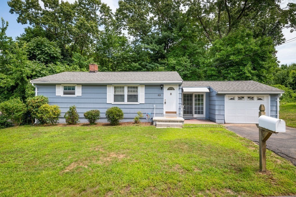 23 Plumtree Circle Springfield, MA 01118 - Photo 1 of 29 a view of a house with a yard and sitting area
