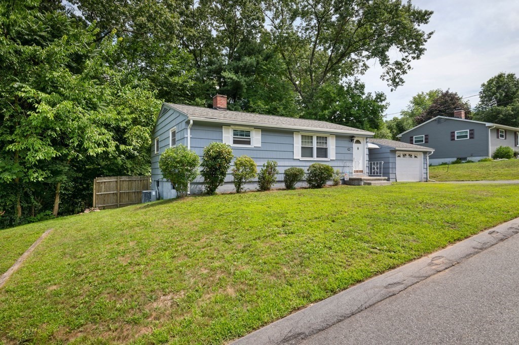 23 Plumtree Circle Springfield, MA 01118 - Photo 3 of 29 a front view of house with yard and green space