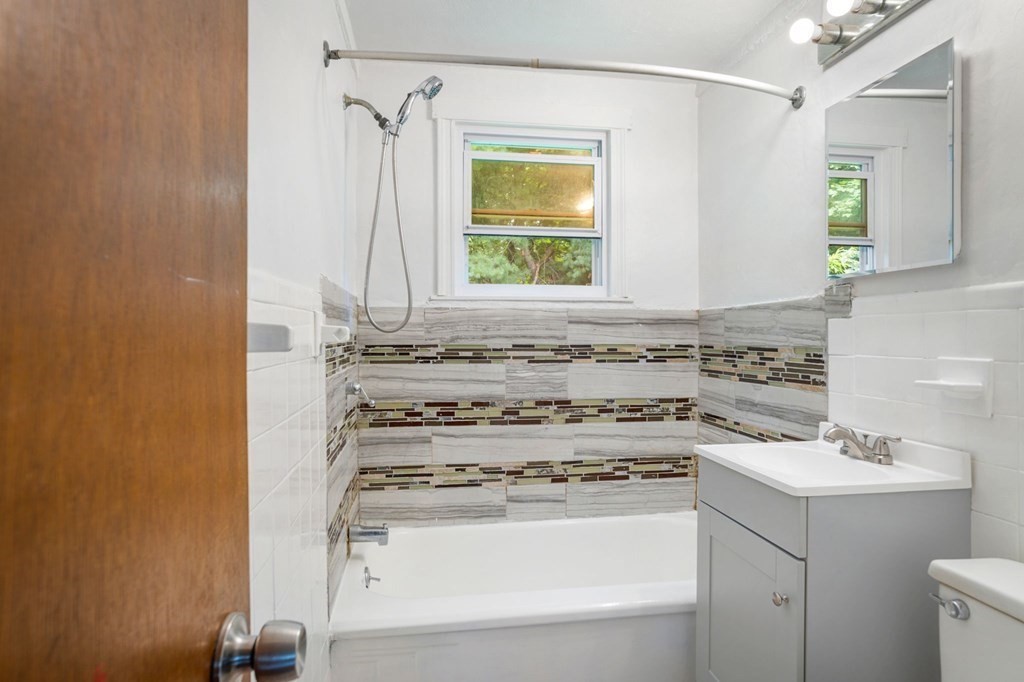 23 Plumtree Circle Springfield, MA 01118 - Photo 7 of 29 a view of a sink and a mirror