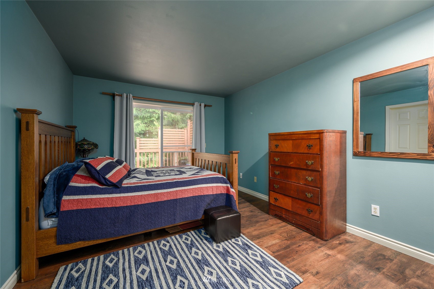 719 W Road Sedro-Woolley, WA 98284 - Photo 11 of 22 a bedroom with a bed and a window