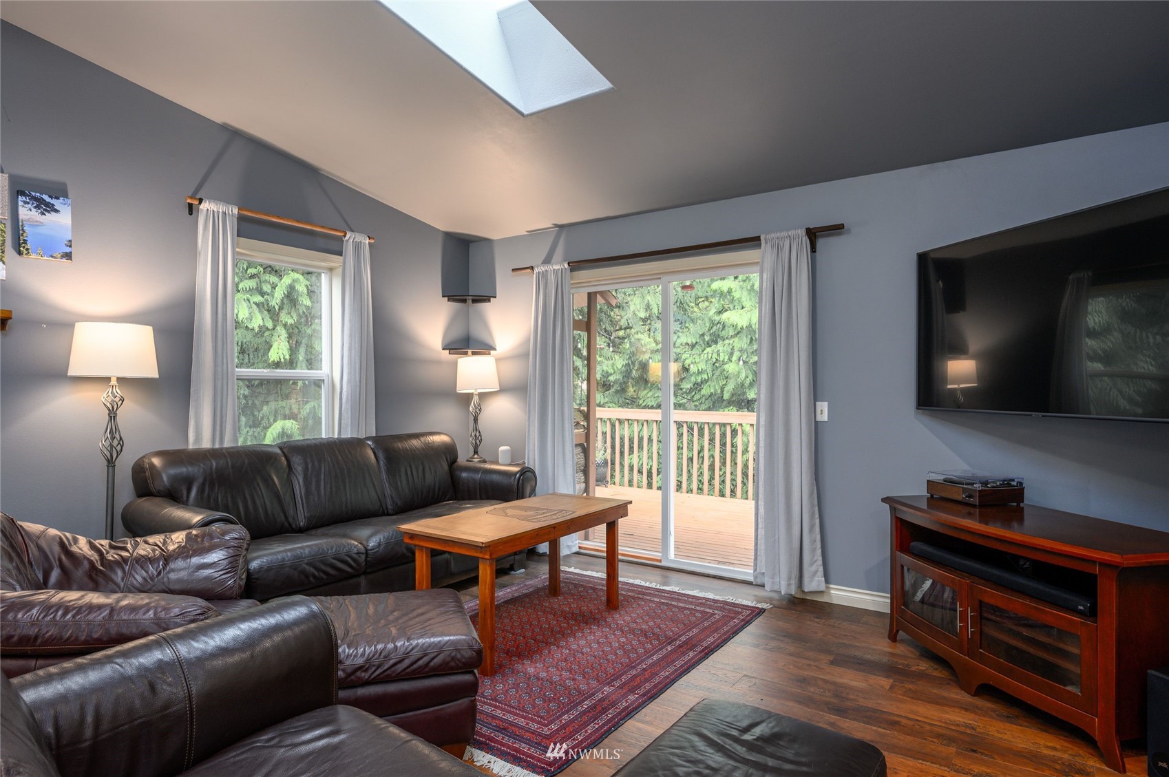 719 W Road Sedro-Woolley, WA 98284 - Photo 5 of 22 a living room with furniture and a flat screen tv
