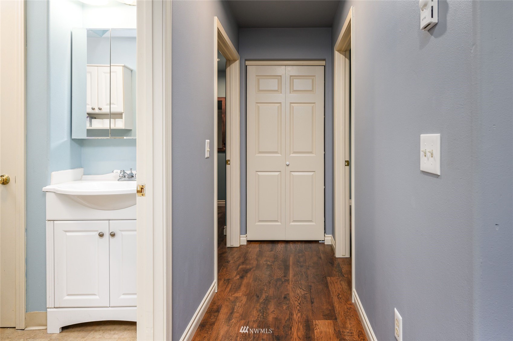 719 W Road Sedro-Woolley, WA 98284 - Photo 9 of 22 a view of a bathroom from the hallway