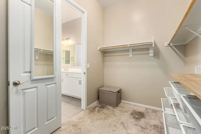 a view of a storage & utility room with cabinets