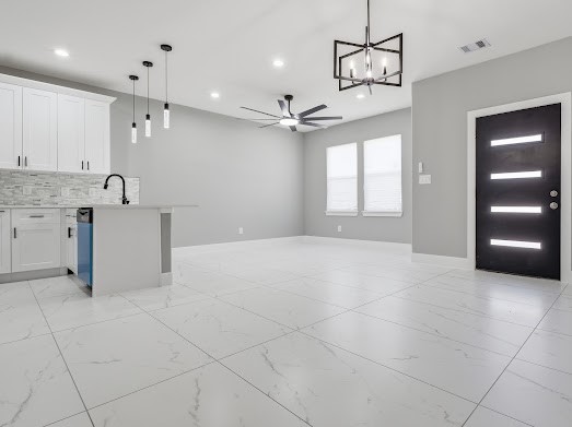 8216 Locksley Road, Unit B Houston, TX 77078 - Photo 4 of 15 a view of a kitchen with a sink and a window