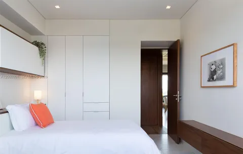 a view of a living room and bathroom