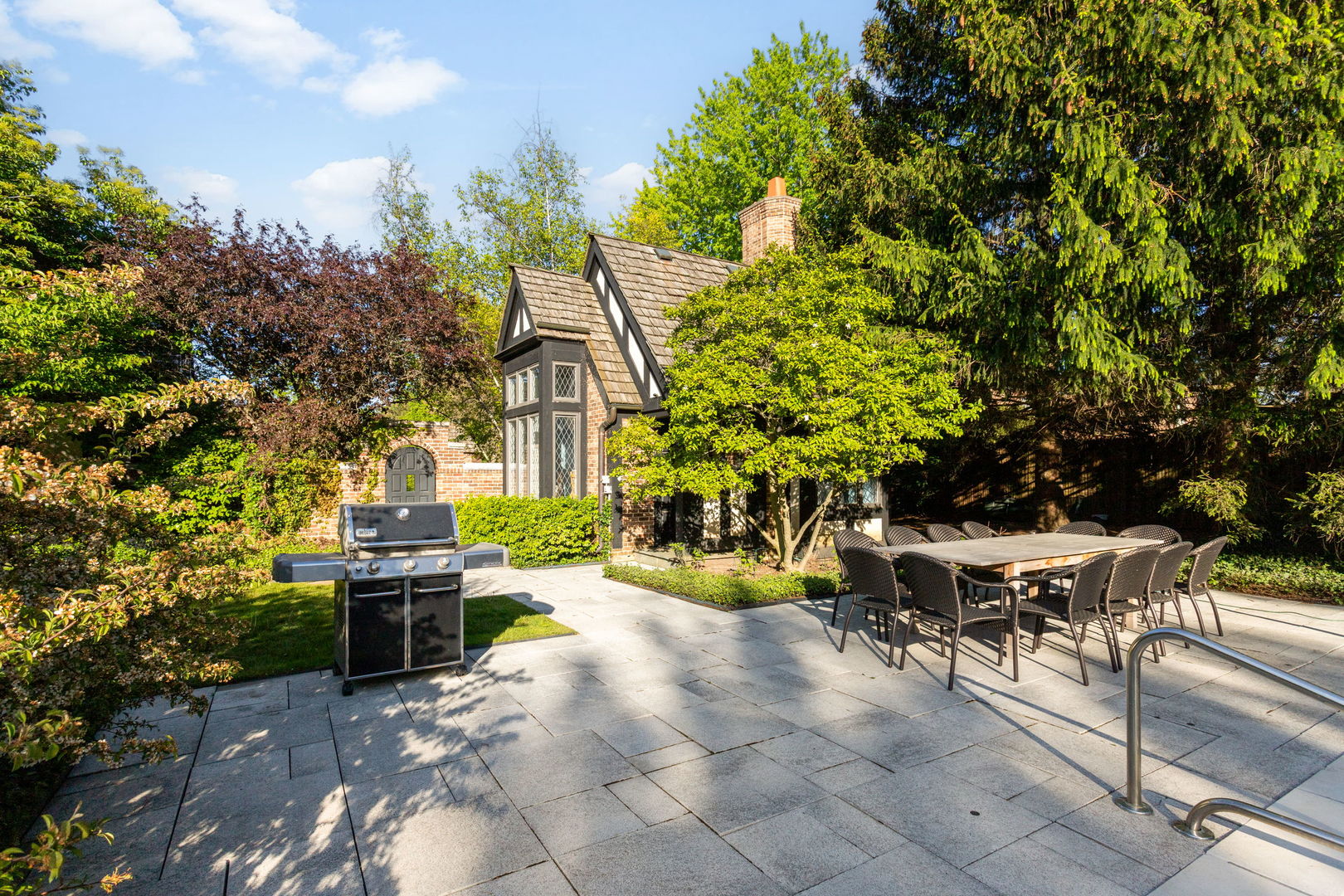 1490 Lake Road Lake Forest, IL 60045 - Photo 37 of 44 a view of a patio with table and chairs and potted plants