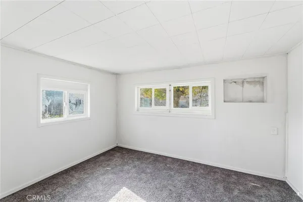 a view of a room with an empty space