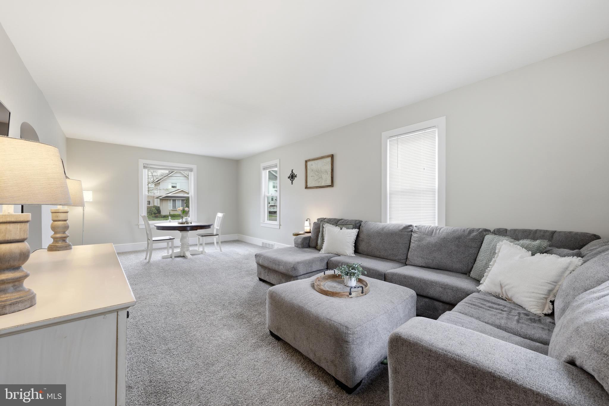 212 Grape Street Hammonton, NJ 08037 - Photo 11 of 36 a living room with furniture and a couch