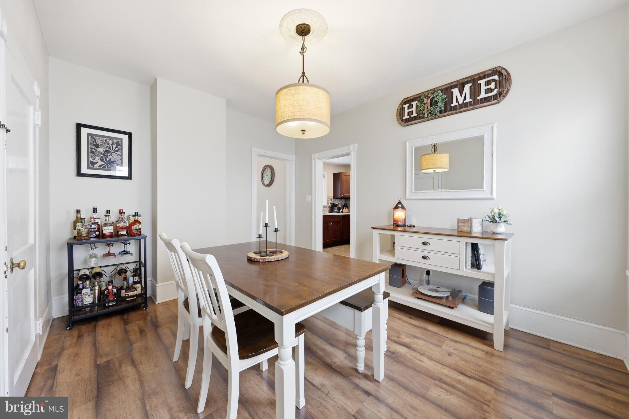 212 Grape Street Hammonton, NJ 08037 - Photo 13 of 36 a view of a dining room with furniture and wooden floor