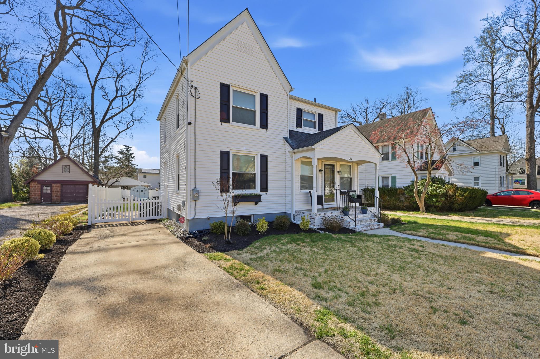 212 Grape Street Hammonton, NJ 08037 - Photo 2 of 36 a front view of a house with a yard
