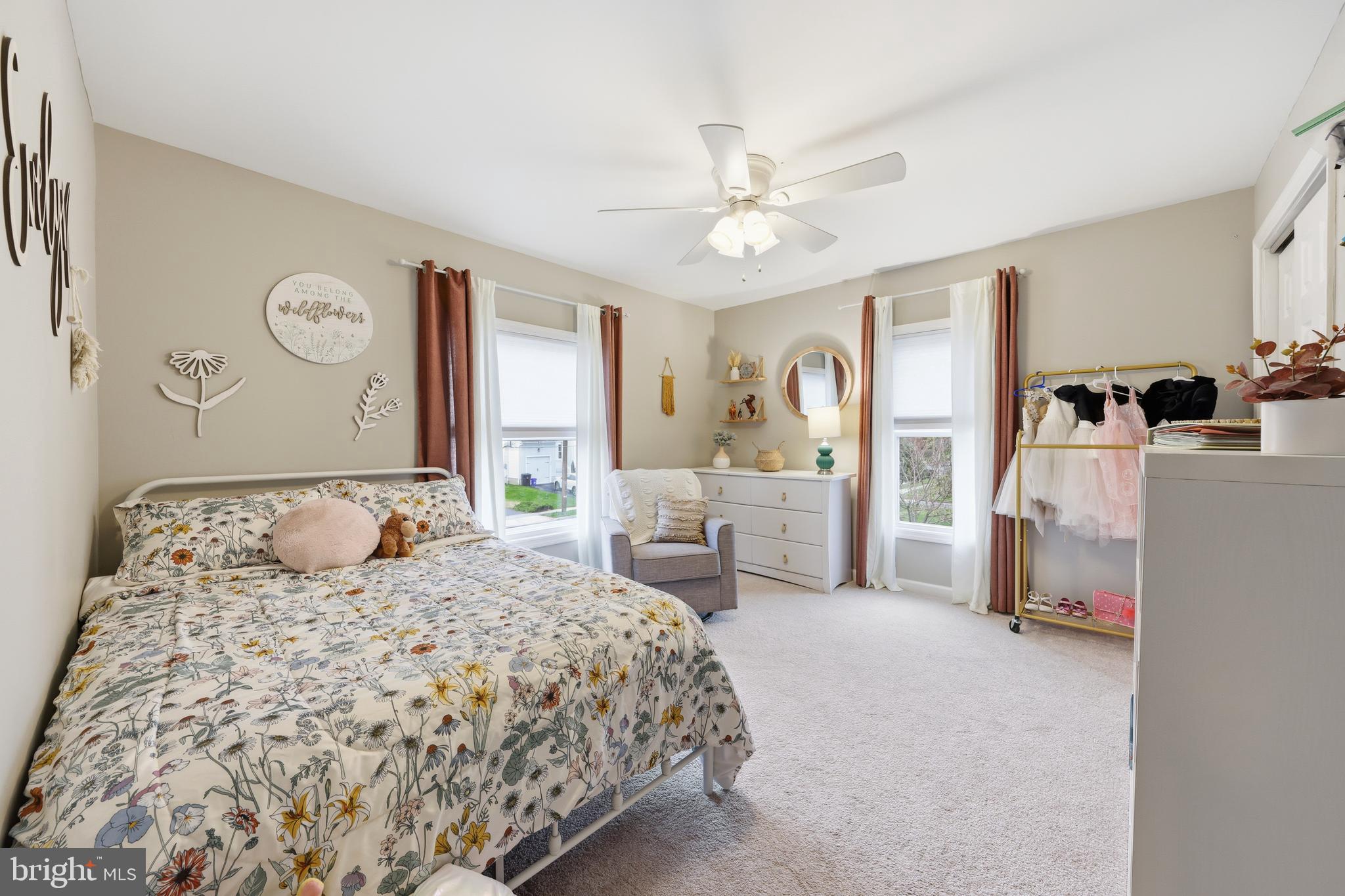 212 Grape Street Hammonton, NJ 08037 - Photo 27 of 36 a bedroom with a bed and a chandelier