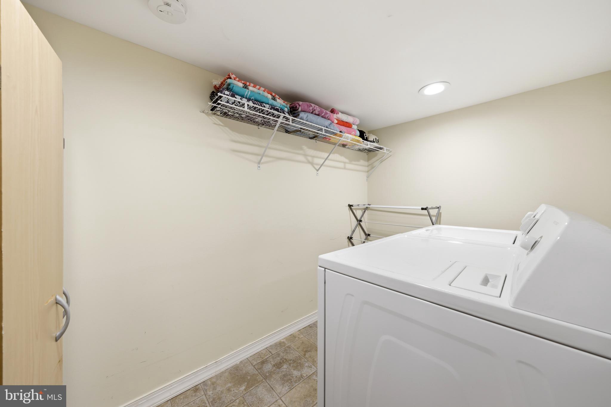 212 Grape Street Hammonton, NJ 08037 - Photo 30 of 36 a utility room with dryer and washer