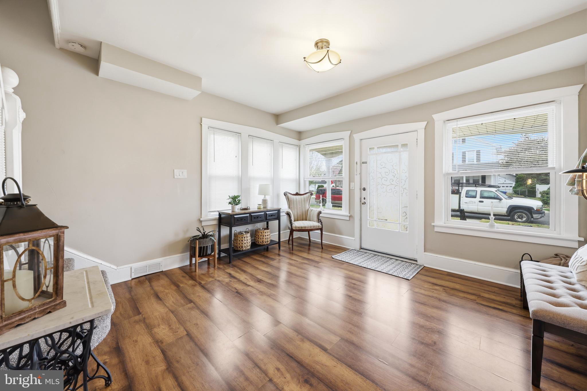 212 Grape Street Hammonton, NJ 08037 - Photo 7 of 36 a living room with furniture and a table