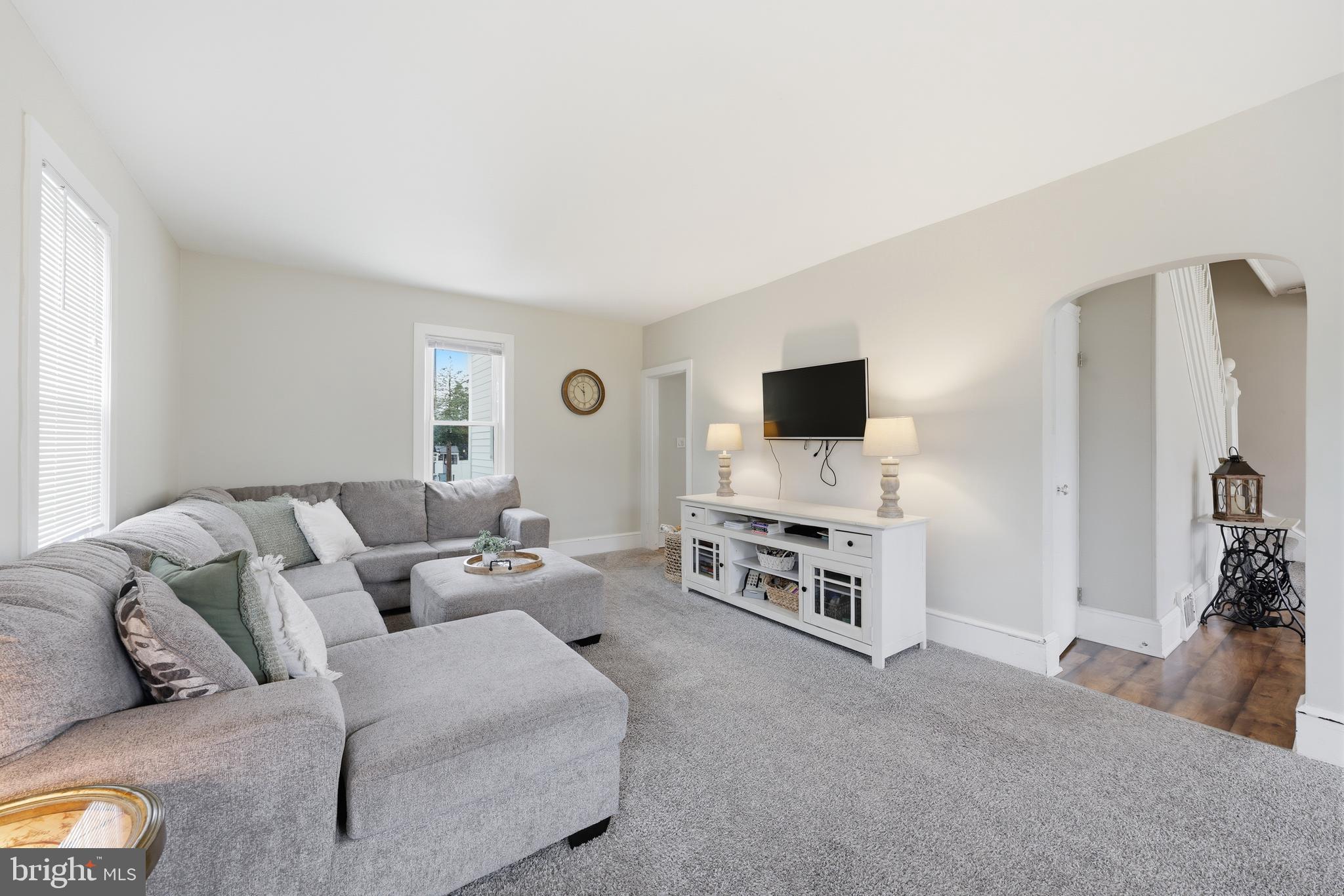 212 Grape Street Hammonton, NJ 08037 - Photo 10 of 36 a living room with furniture and a flat screen tv