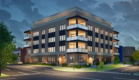 a tall building sitting on the side of a street