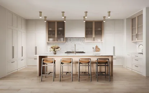 a kitchen with a sink and chairs