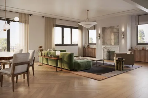 a living room with furniture a window and a chandelier