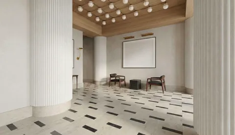 a bathroom with a sink mirror and vanity