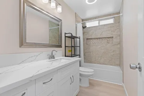 a view of a floor to ceiling window and a ocean view