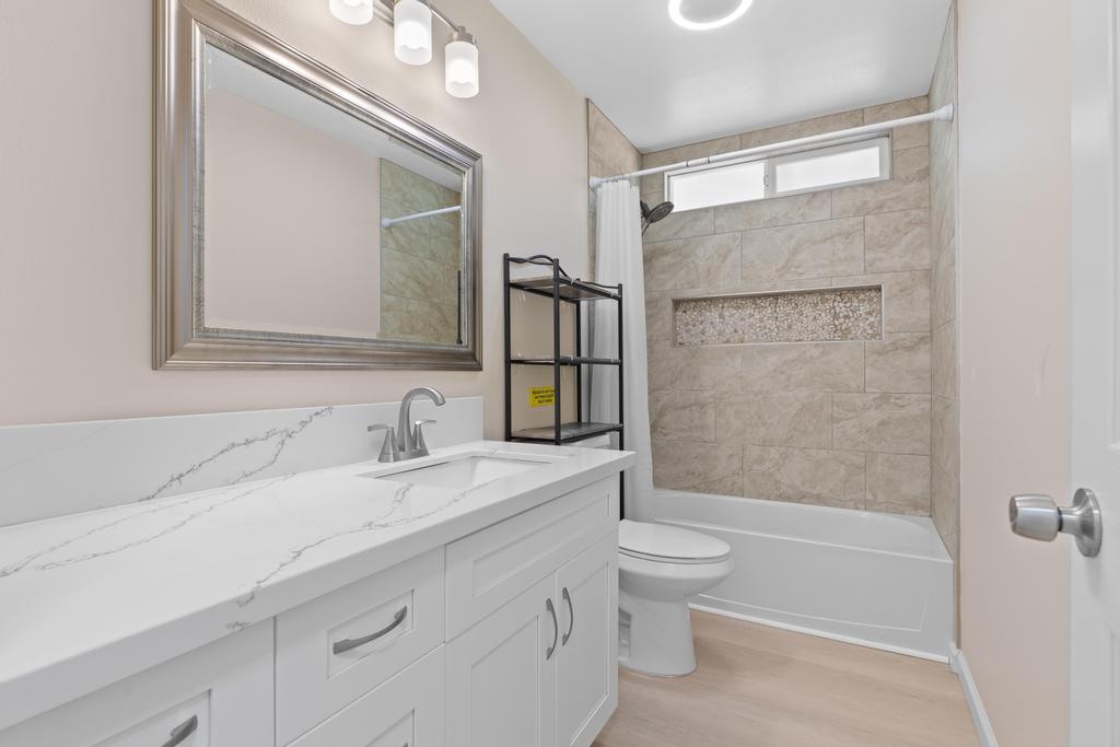 15-1622 12th Avenue Keaau, HI 96749 - Photo 16 of 30 a bathroom with a sink a toilet and shower