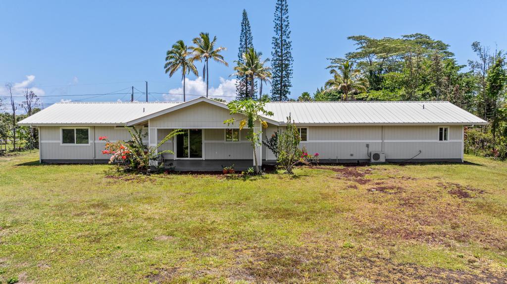 15-1622 12th Avenue Keaau, HI 96749 - Photo 27 of 30 a front view of a house with a garden