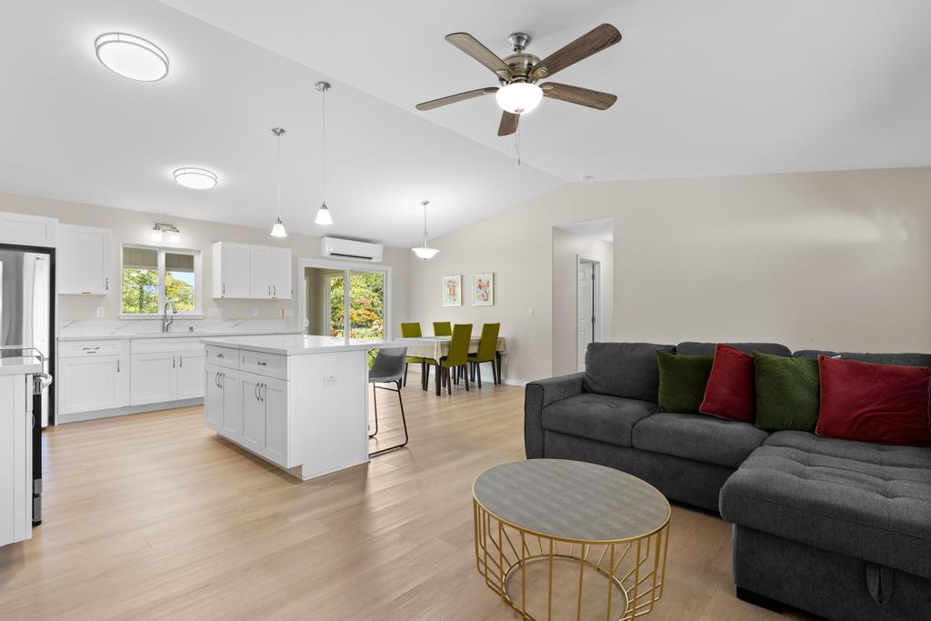 15-1622 12th Avenue Keaau, HI 96749 - Photo 5 of 30 a living room with furniture and kitchen view