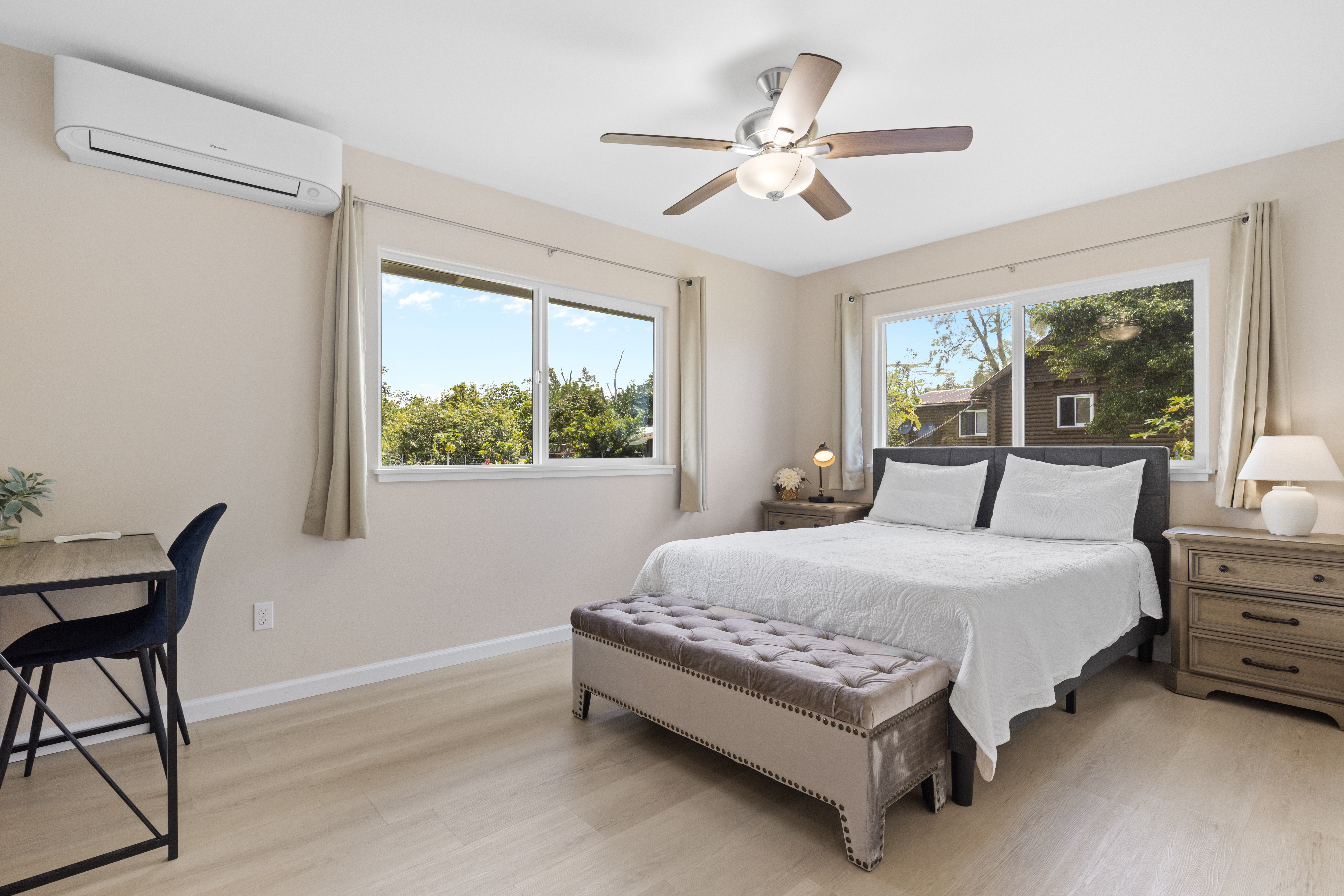 15-1622 12th Avenue Keaau, HI 96749 - Photo 10 of 30 a bedroom with a bed chandelier and window