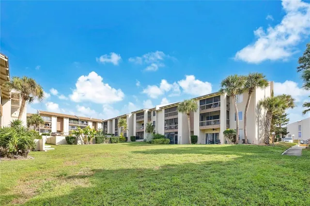 a view of a house with a big yard