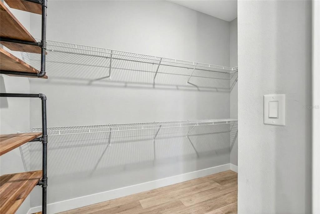 3699 Southwest 177th Lane Road Ocala, FL 34473 - Photo 14 of 26 a view of a room with racks on the wall