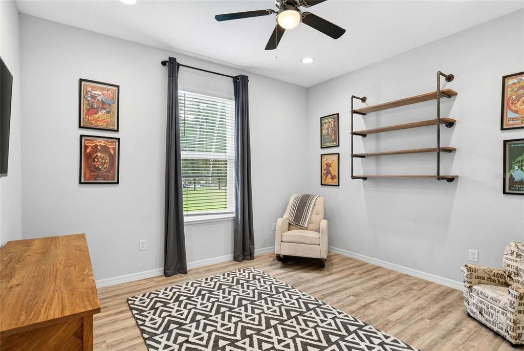 3699 Southwest 177th Lane Road Ocala, FL 34473 - Photo 15 of 26 a bedroom with a bed and a couch