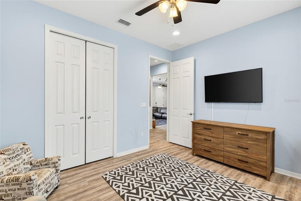 3699 Southwest 177th Lane Road Ocala, FL 34473 - Photo 16 of 26 a living room with furniture and a flat screen tv