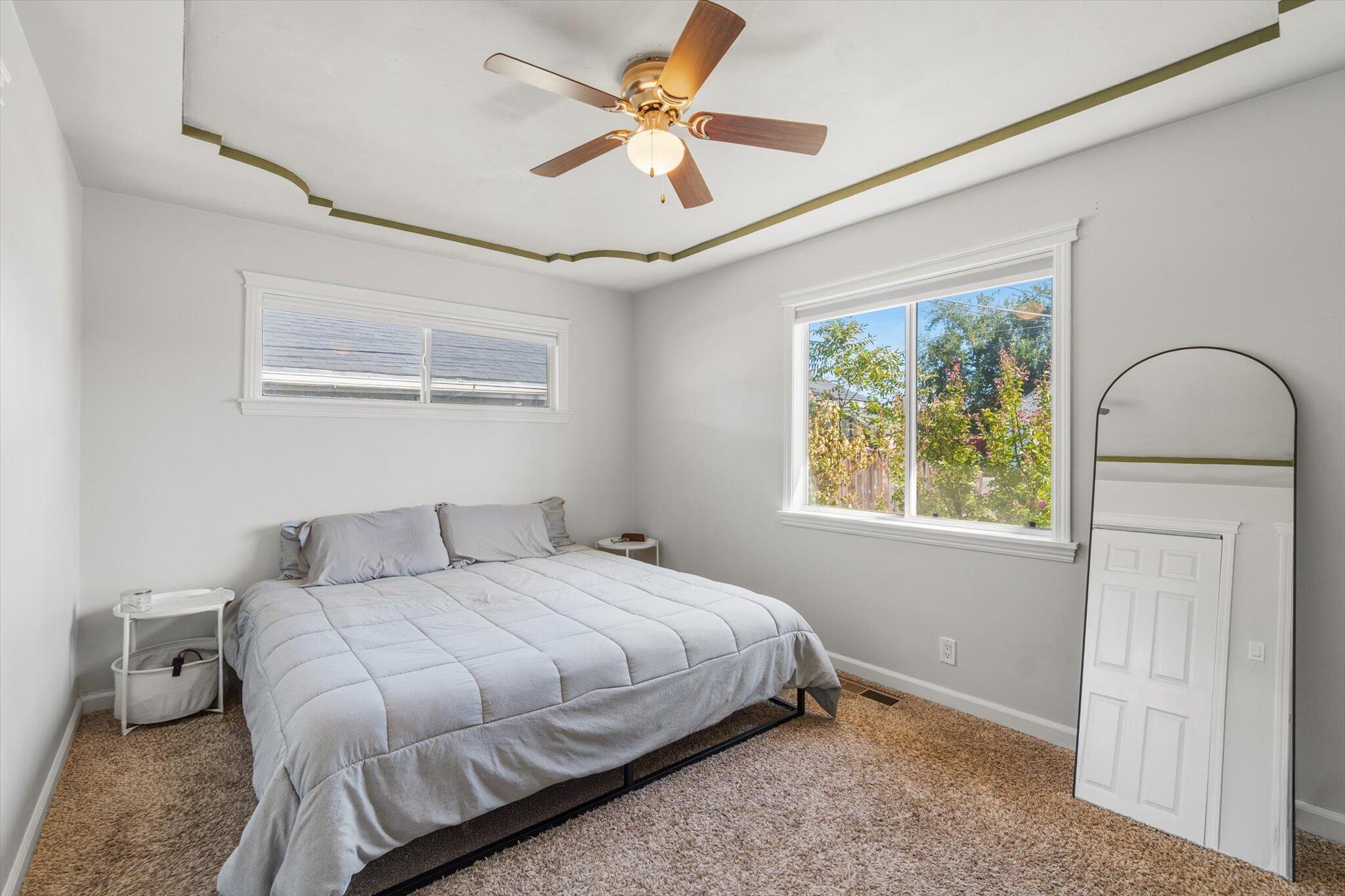 1514 Walbridge Street Red Bluff, CA 96080 - Photo 14 of 36 a bedroom with a bed and a window