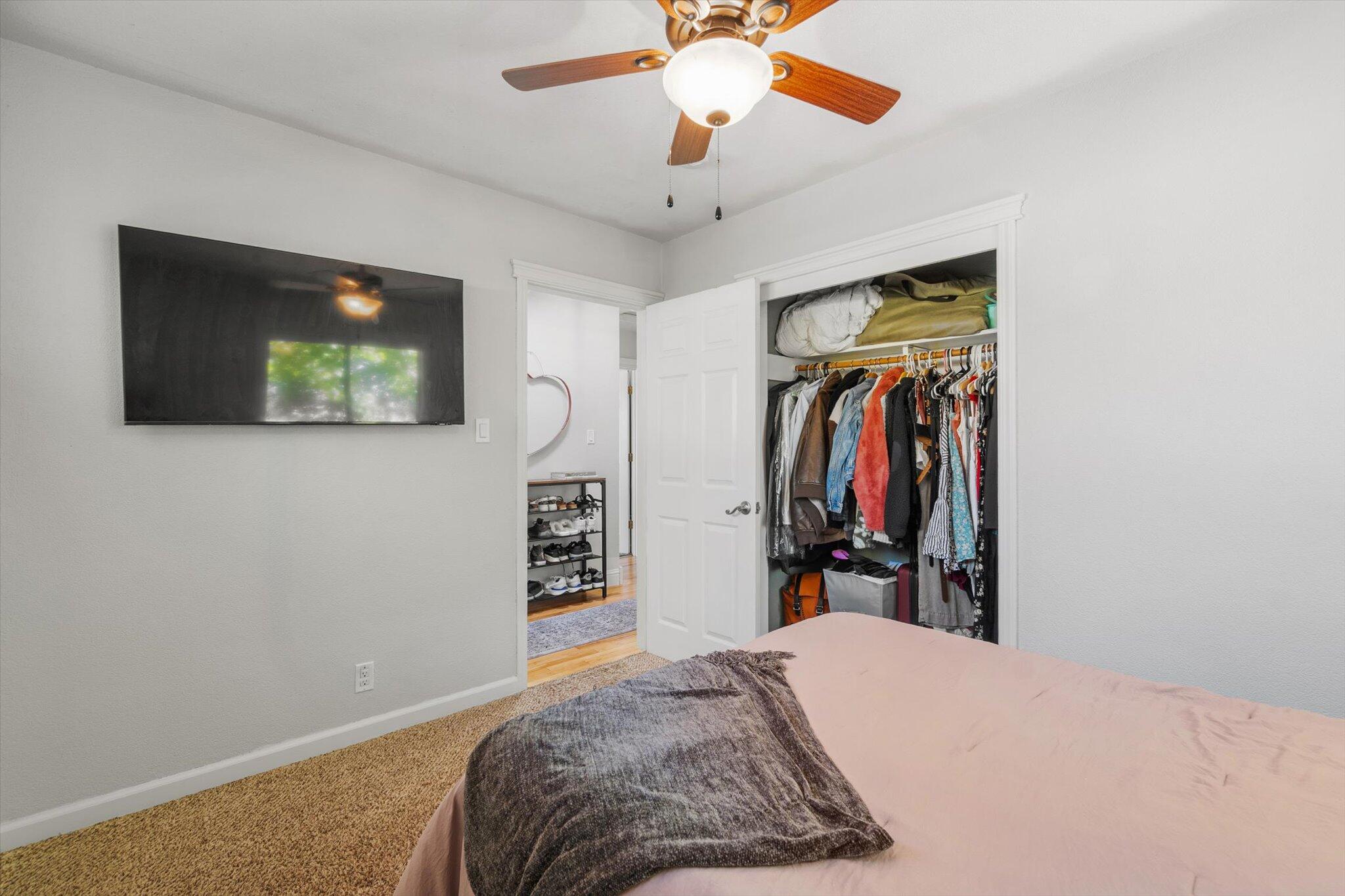 1514 Walbridge Street Red Bluff, CA 96080 - Photo 18 of 36 a bed room with a bed and a walk in closet