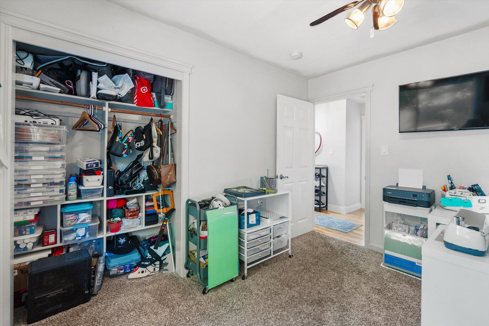 1514 Walbridge Street Red Bluff, CA 96080 - Photo 20 of 36 a view of a livingroom with furniture and a flat screen tv