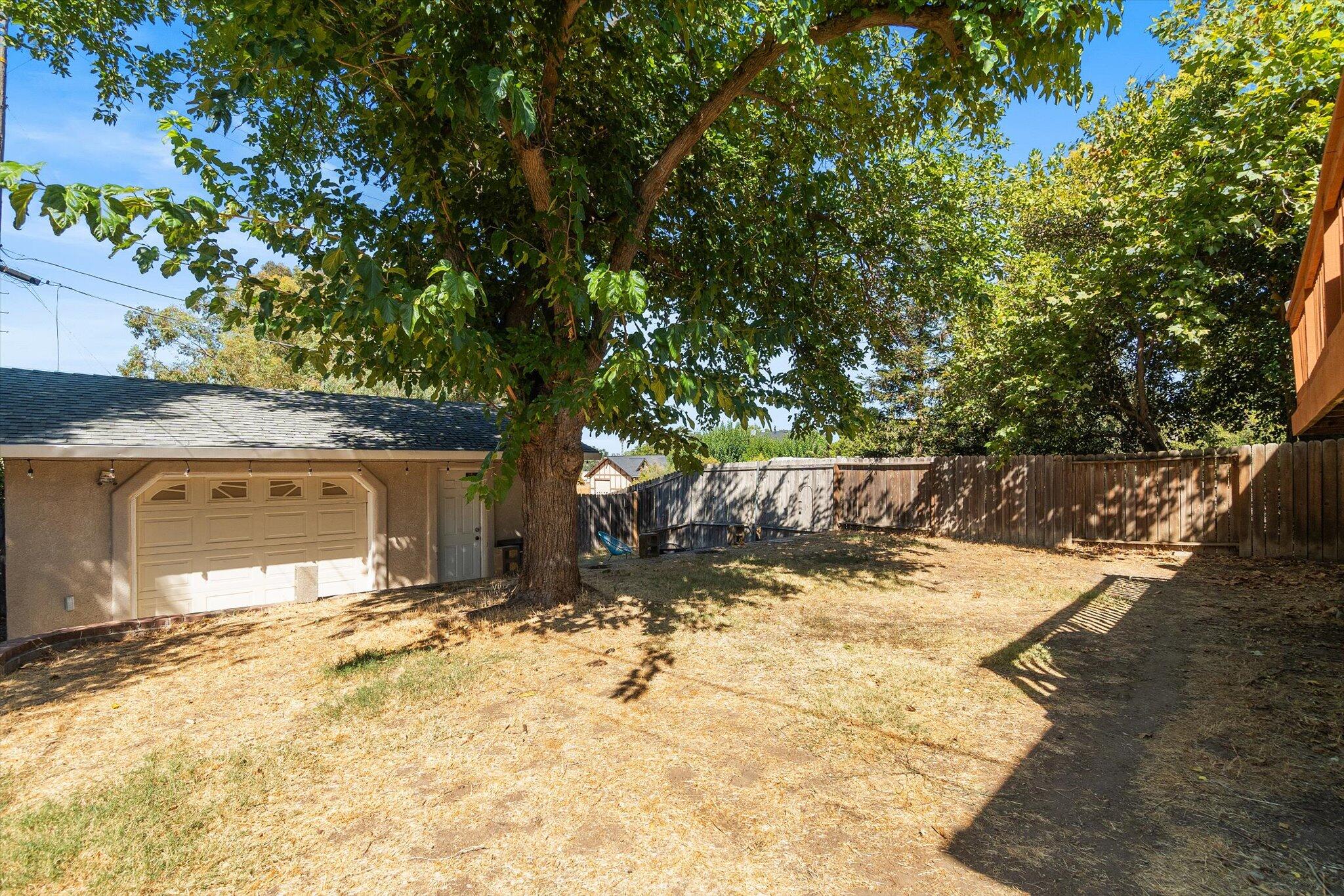 1514 Walbridge Street Red Bluff, CA 96080 - Photo 24 of 36 a view of a backyard of the house