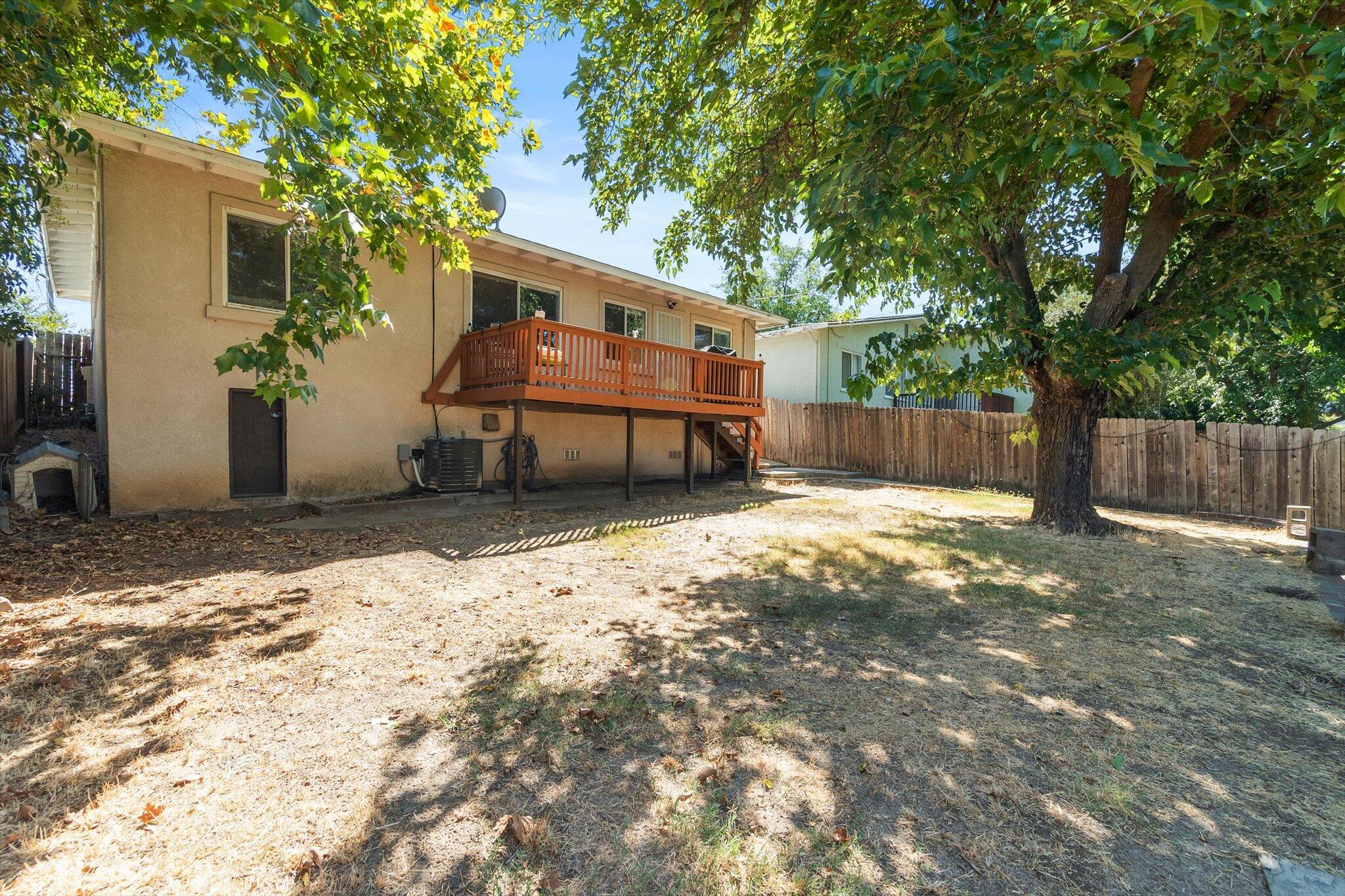 1514 Walbridge Street Red Bluff, CA 96080 - Photo 26 of 36 a view of a house with a yard