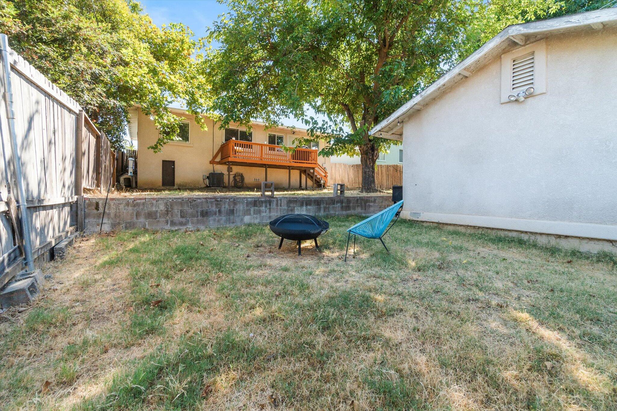 1514 Walbridge Street Red Bluff, CA 96080 - Photo 29 of 36 a backyard of a house with table and chairs