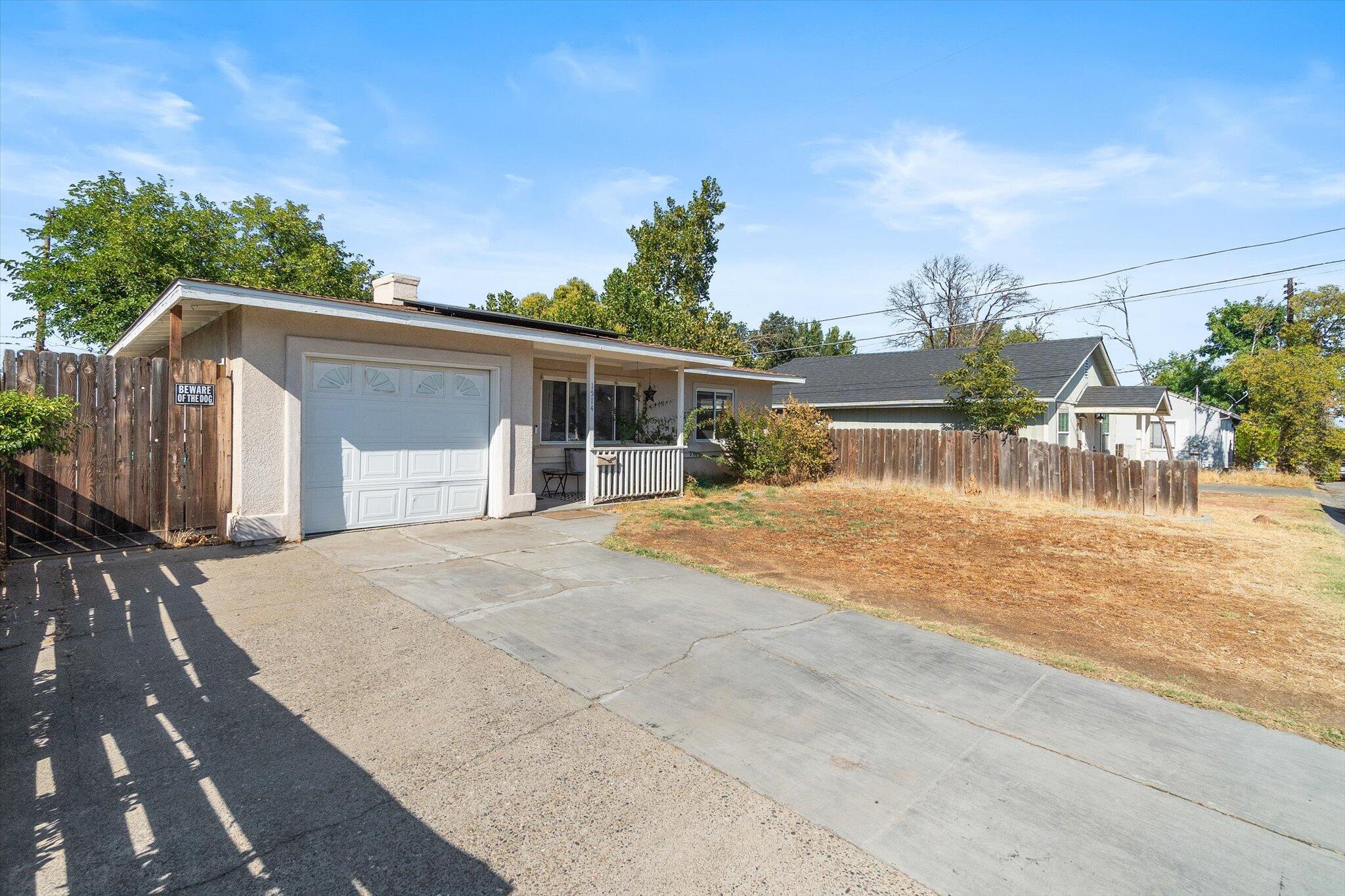 1514 Walbridge Street Red Bluff, CA 96080 - Photo 33 of 36 a front view of house with yard