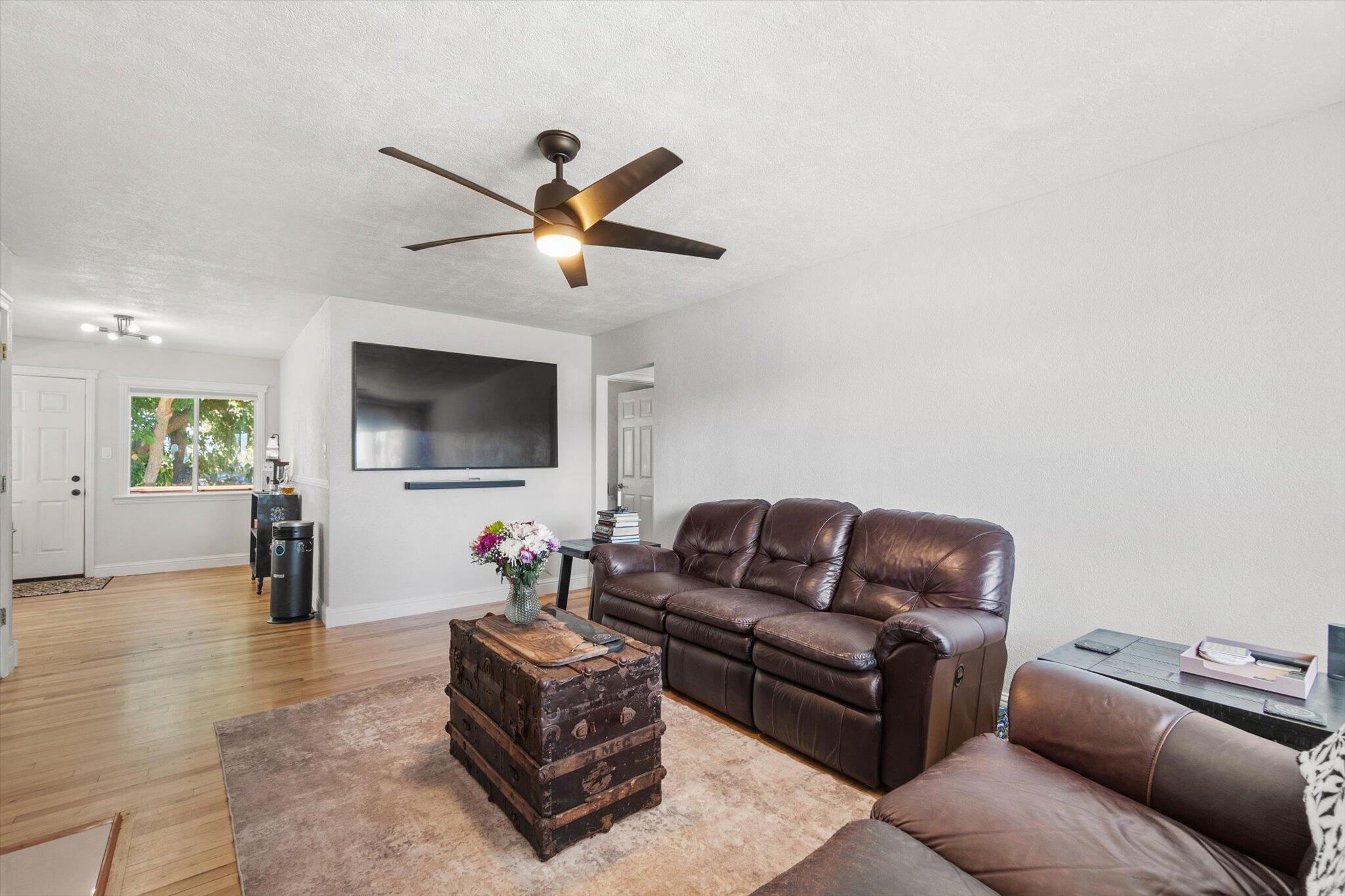 1514 Walbridge Street Red Bluff, CA 96080 - Photo 6 of 36 a living room with furniture and a flat screen tv